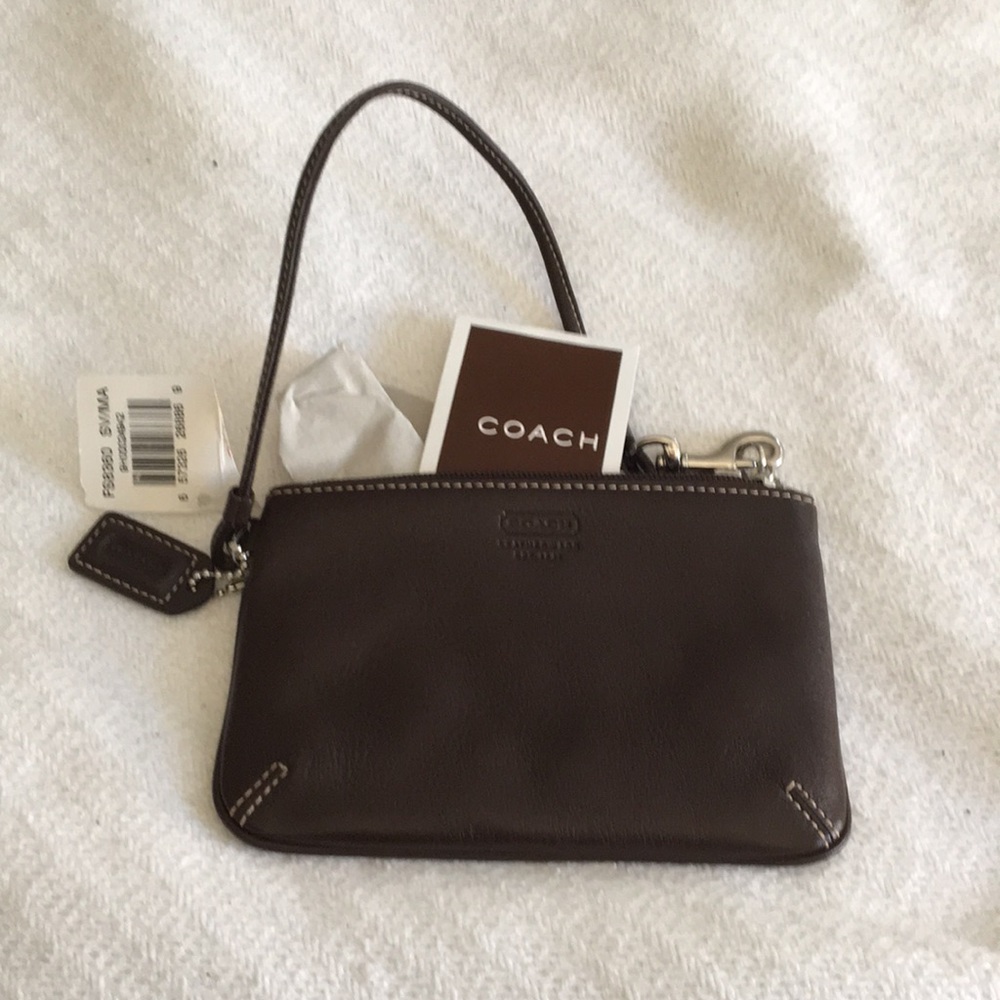 Coach. Small wristlet.